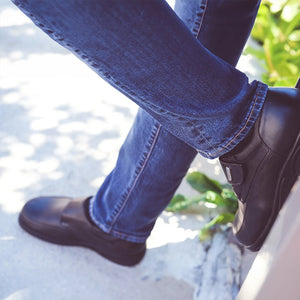 Man wearing extra wide and deep fitting orthopedic shoes by TDO, providing superior comfort and stability.