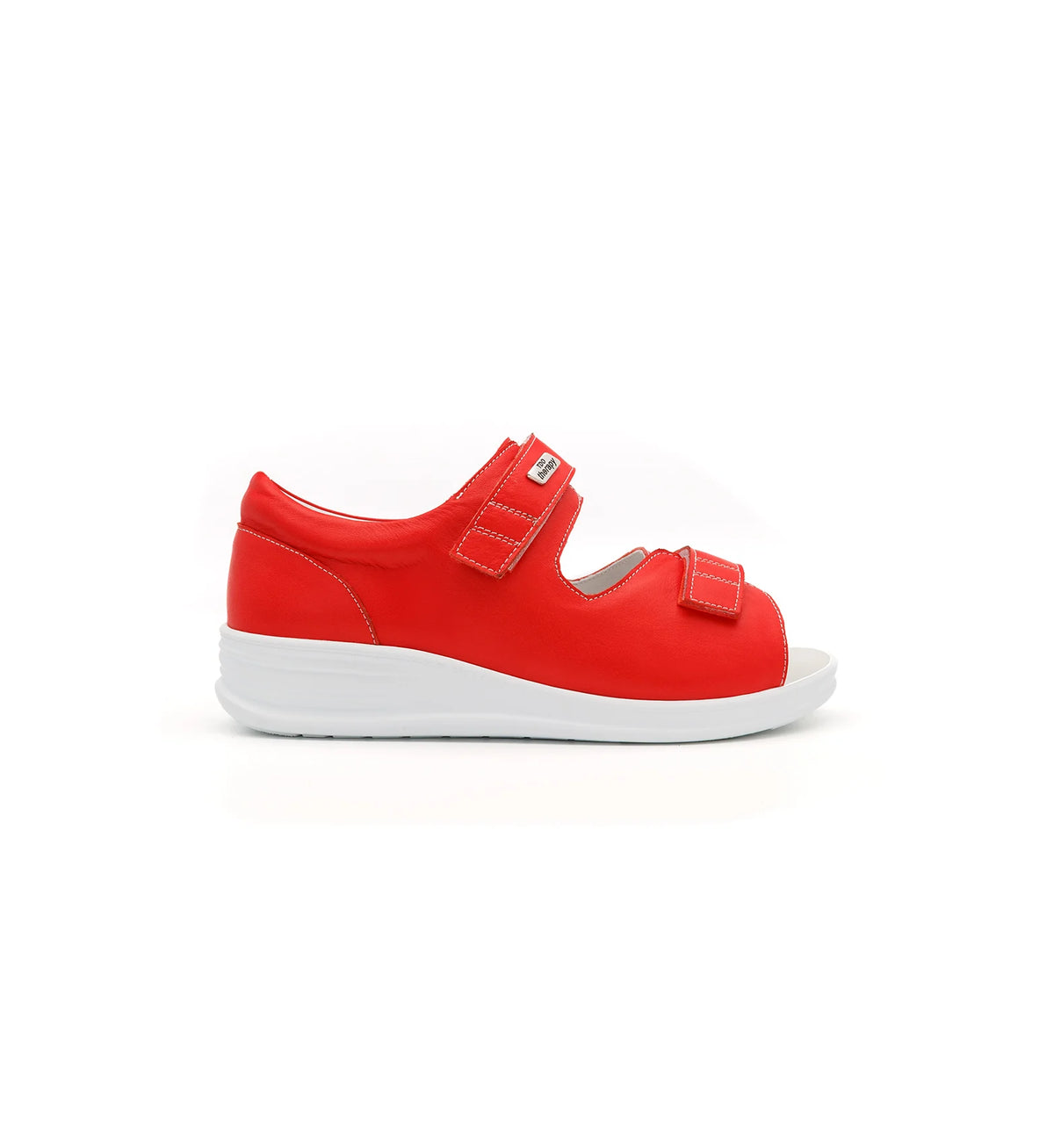 Side view of the red Cove women’s EEE wide fit orthopedic sandal with a cushioned white sole.