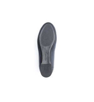 Women's navy flat shoes with a supportive sole.