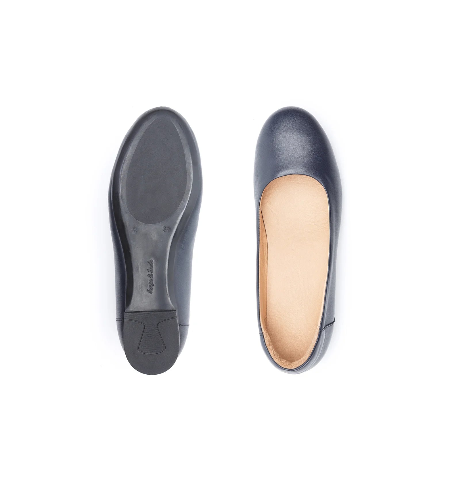 Women’s navy leather wide fit flats with rigid sole for extra stability.
