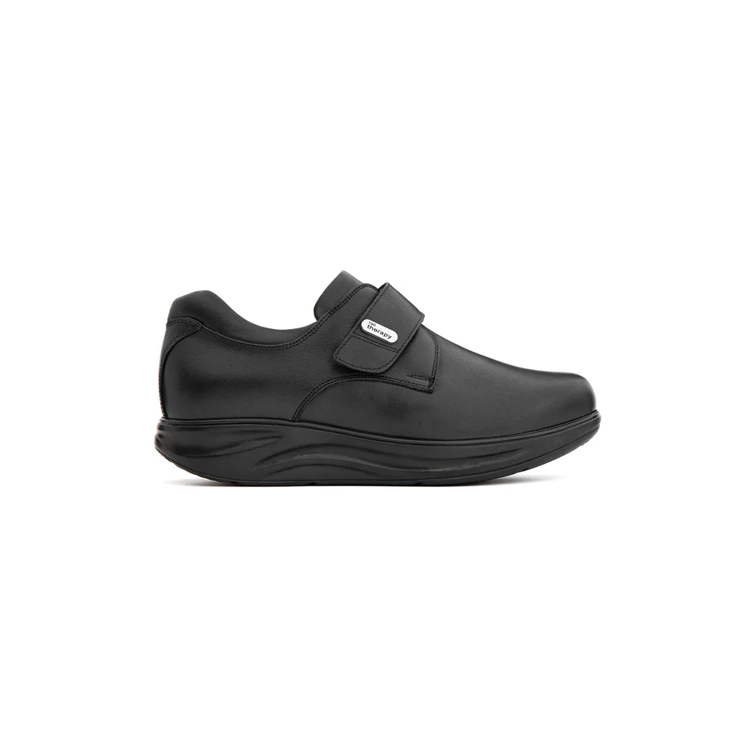 Wide orthopedic shoe with removable insole for diabetic foot care.