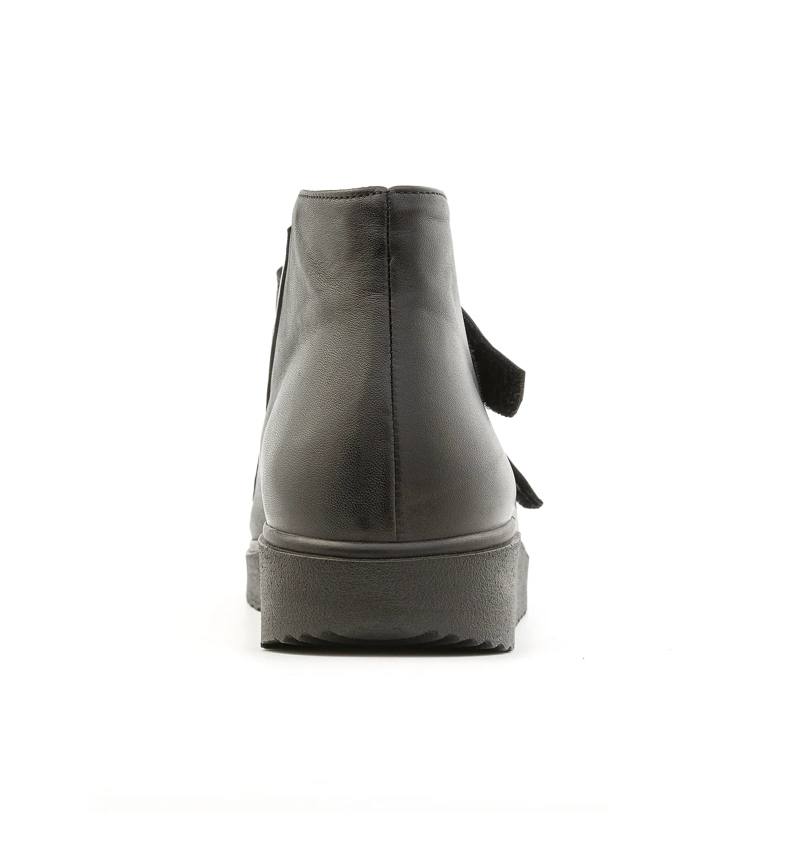 Women’s black orthopaedic boots with reinforced heel support rear view