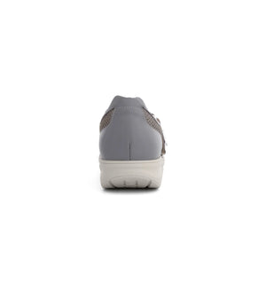 Women’s orthopaedic rocker sandal showing stable heel support and cushioned sole